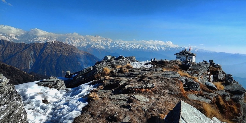 Stunning Chandrashila peak offering panoramic views of surrounding Himalayan ranges.