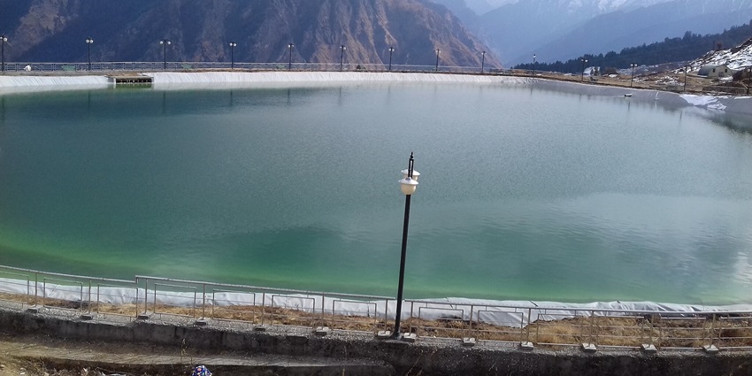 A serene lake in Auli, a place near the Nanda Devi National Park