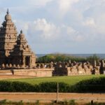 Chettipunniyam Temple with the ancient temple in the middle of a green landscape.