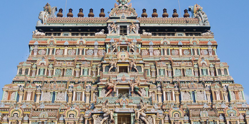 Close-up of the artwork on the gopuram of Nataraja Temple in traditional craftsmanship.