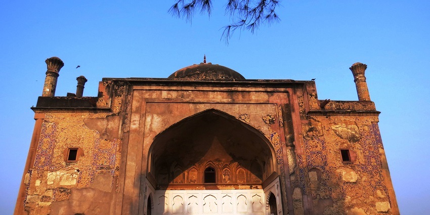 Explore the rich colourful tapestry of Mughal artistry, a place to visit near Fatehpur Sikri Fort.