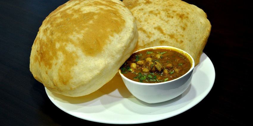 The best food in Dehradun is the spicy chickpeas served with fluffy deep-fried bread, Bhature.
