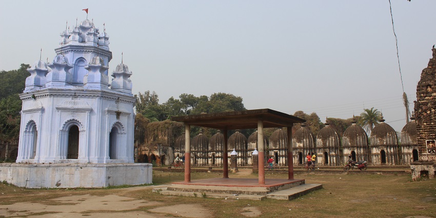 A beautiful temple dedicated to goddess Kali, built in a traditional architecture with intricate wall carvings.