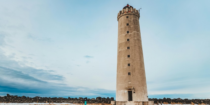 A view of the Velankanni Lighthouse towering against the coastal backdrop.