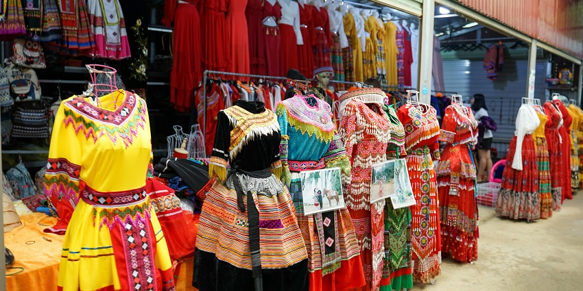 Traditional clothes displayed outside a shop in the cloth market