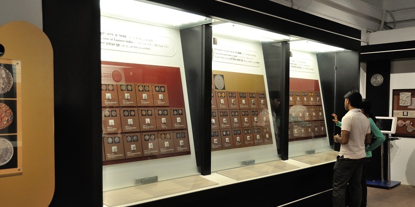 Display of various coins in the Coin Museum, one of the popular museums in Maharashtra