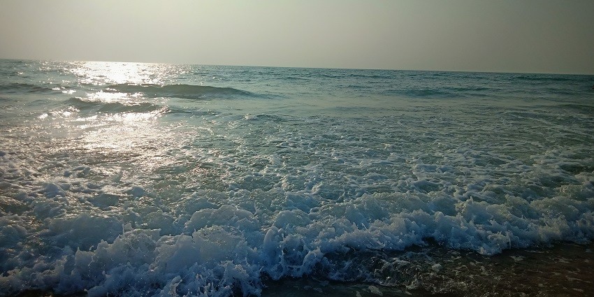 Colva beach with beautiful waves and pure white sand.