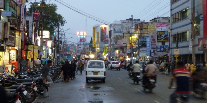 Street shopping in Coimbatore market known for street food and shopping variety.