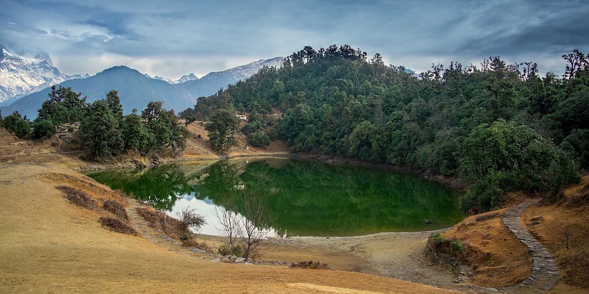 Serene Lake reflecting mountains, perfect for nature lovers' retreats.