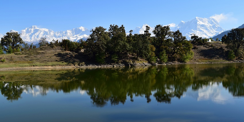 Scenic lake surrounded by mountains, ideal for nature lovers.