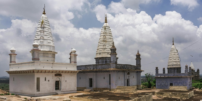 Beautiful temple with intricate architecture, surrounded by a peaceful natural setting.