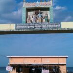 Front view of Devipattinam Navagraha Temple with the idols of deities at the top of the entrance door