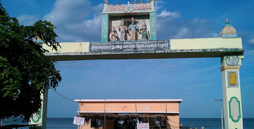 Front view of Devipattinam Navagraha Temple with the idols of deities at the top of the entrance door