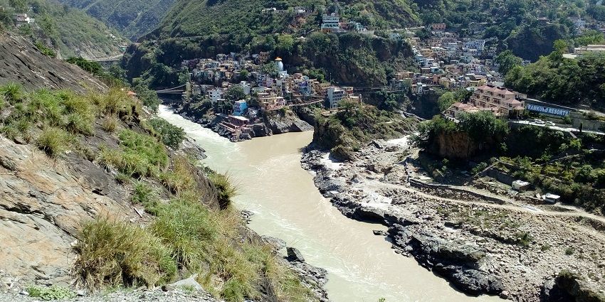 An image showing the Devprayag Sangam, where two holy rivers converge beautifully.