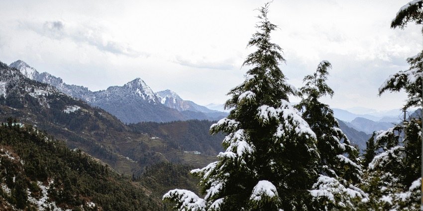 A view of enormous majestic mountains as seen from the hill station of Dhanolti.