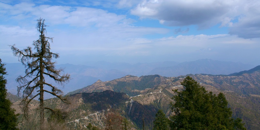 The view of Dhanaulti, a popular attraction inviting visitors for its natural beauty.