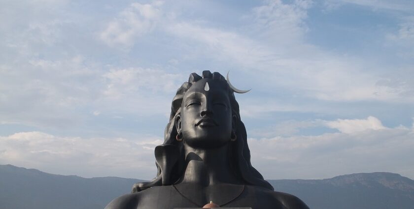 Dhyanalinga Temple, the huge structure of lord shiva at Isha Yoga Center and the area filled with people.