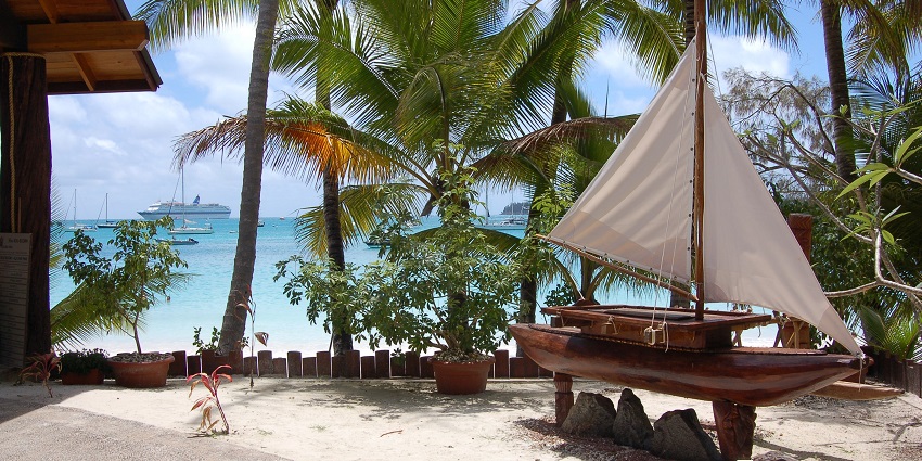 Dining at a beachfront restaurant in Pondicherry, experiencing delicious food and sea views at night.