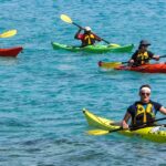 Image of tourists kayaking amidst the serene waters, one of the Diveagar beach water sports