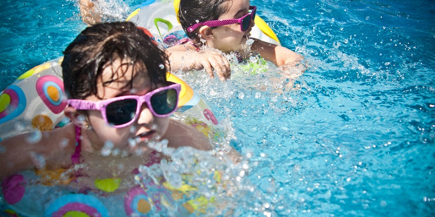 An image featuring thrilling water slides and family-friendly areas.