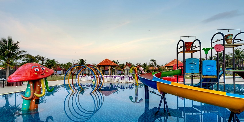 Image of a pool and other fun rides - exploring Karnal Water Park activities.