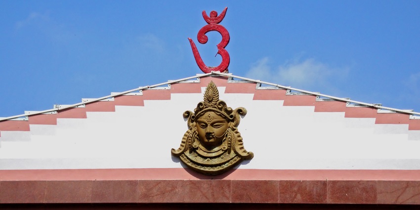 A picture of the vibrant red Durga Temple, which is one of the best places to visit in Kashi.