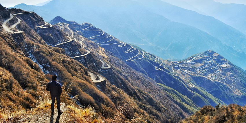 A person trekking. Dzongri Trek is one of the best things to do in Sikkim in March.