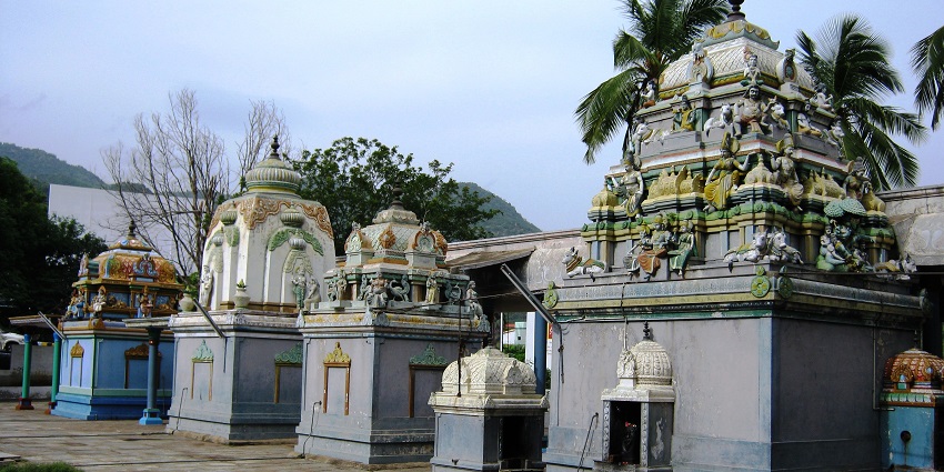Vinayagar Temple with intricate carvings, colourful statues, and detailed architecture.