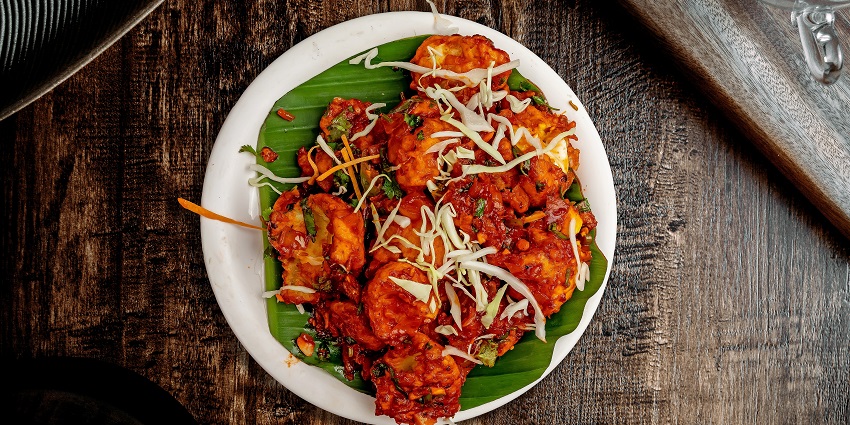 A vibrant view of an Indian dish at Eves Garden which offers a great dining experience.