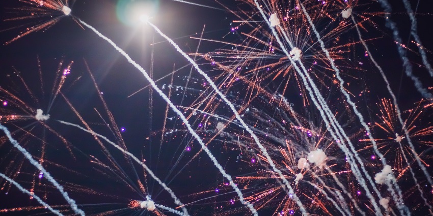 A picture of a colourful local festival in Jhansi, full of sparkling fireworks.