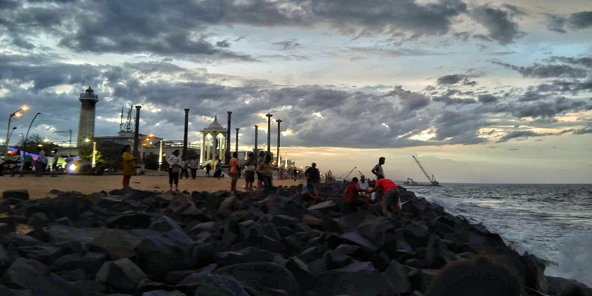 Enjoying a beach bonfire in Pondicherry, is one of the best things to do at night with friends.