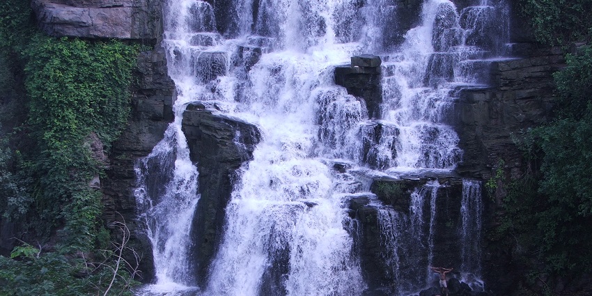 Captivating waterfalls surrounded by lush greenery and tranquility