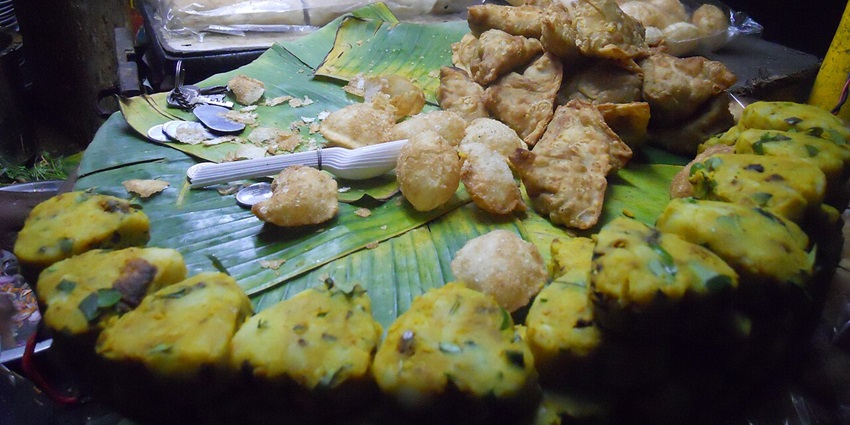 A lively market street filled with colorful shops, traditional textiles, and delicious street food, one of the best things to do in Chennai with friends.