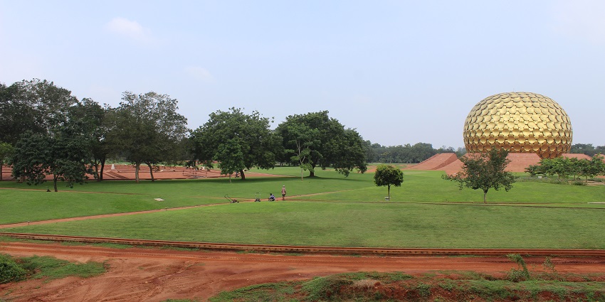 Night exploration of Auroville in Pondicherry, known for its unique community and peaceful surroundings.