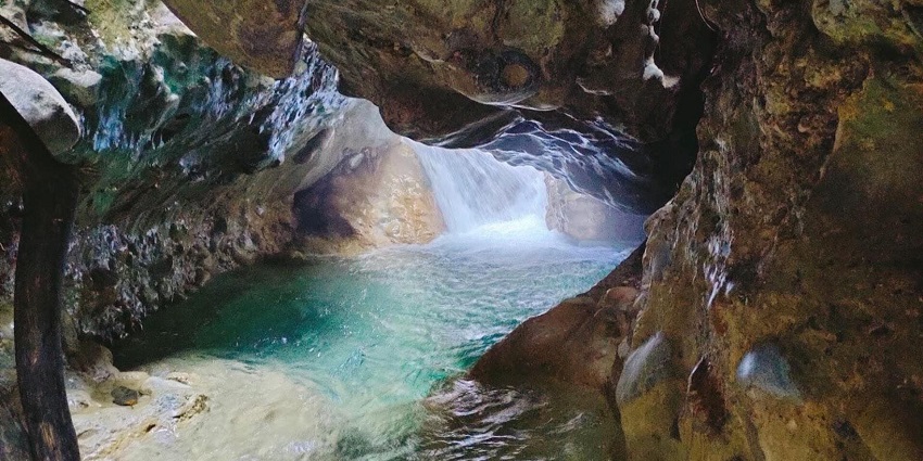 Things to do in Dehradun include exploring cave formation offering adventure.