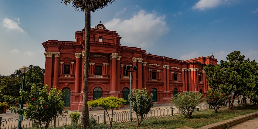 Government Museum building in Bangalore with colonial architecture and surrounding greenery
