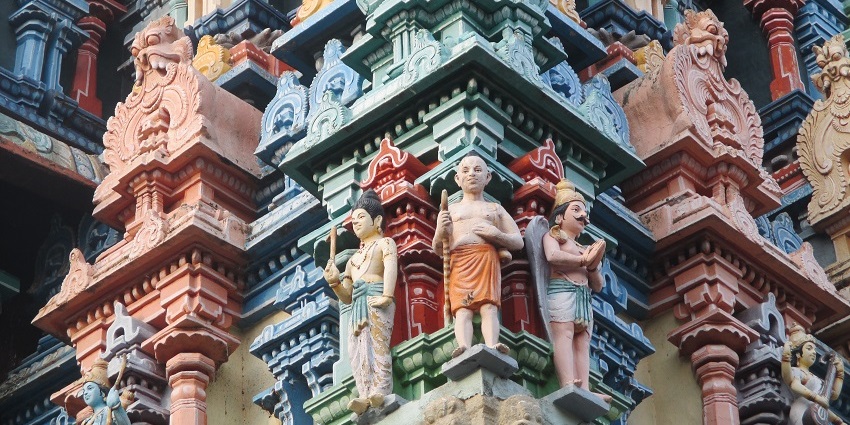Thadikombu Temple's majestic gopuram adorned with detailed carvings and vibrant sculptures