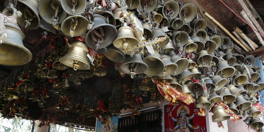 A glimpse of a unique exhibit showcasing a variety of historic and artistic bells.