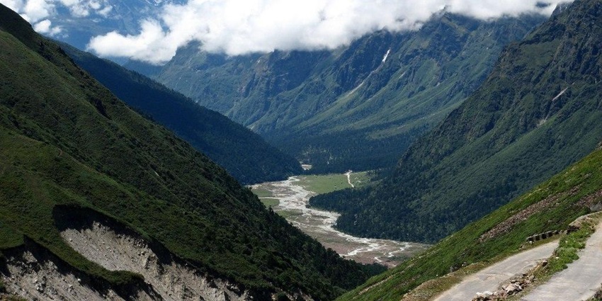 Panoramic view of Yumthang Valley, North Sikkim, showcasing lush meadows and snow-capped peaks