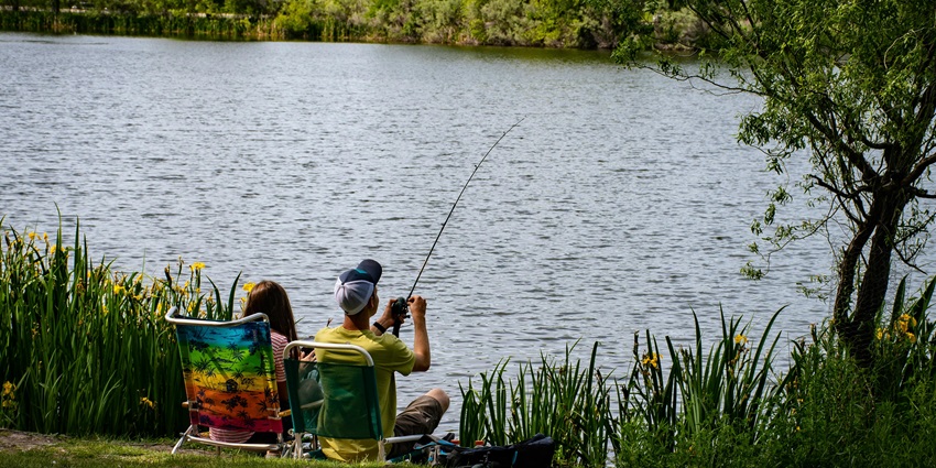 An image depicting fishermen enjoying fishing, one of the best water sports in Kihim.