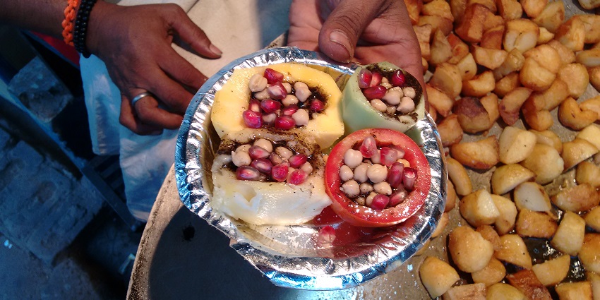 A refreshing mix of seasonal fruits with tangy spices sprinkled.
