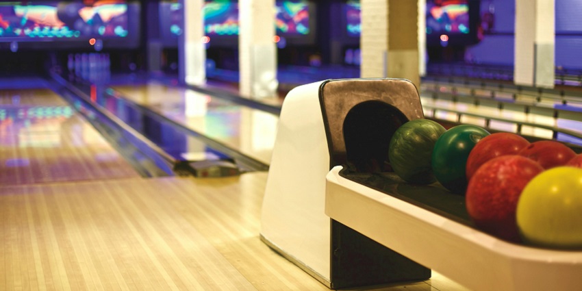 An image of balls in a bowling court, one of the best things to do at DLF mall of India.