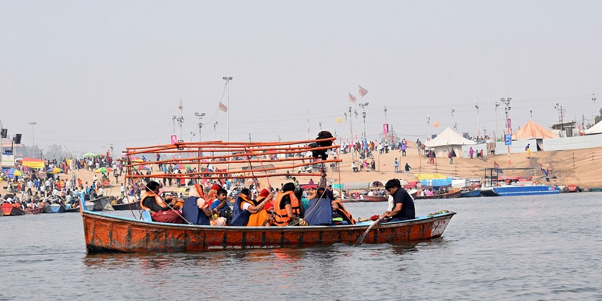 A vibrant view of Ganga Barrage showcases a boat, a famous place near Kanpur Zoo.