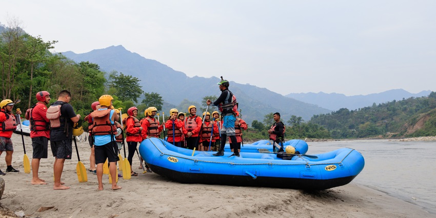 Adventure sports in Rishikesh include rafting journeys on the holy Ganga River's rapids.