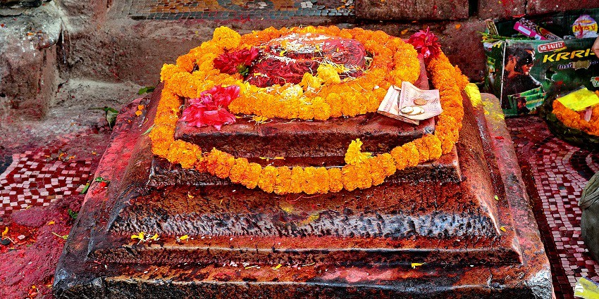 The shrine of Gaur is adorned with flower garlands in a temple in Rudraprayag