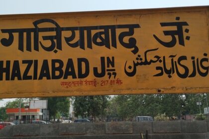 The image shows the Ghaziabad railway station board featuring the station's name.