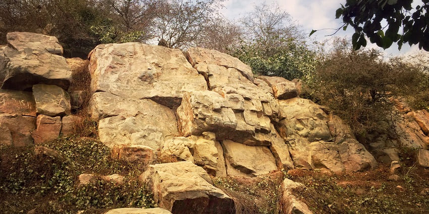 View of Govardhan Hill, an important pilgrimage site near Gokul Temple.