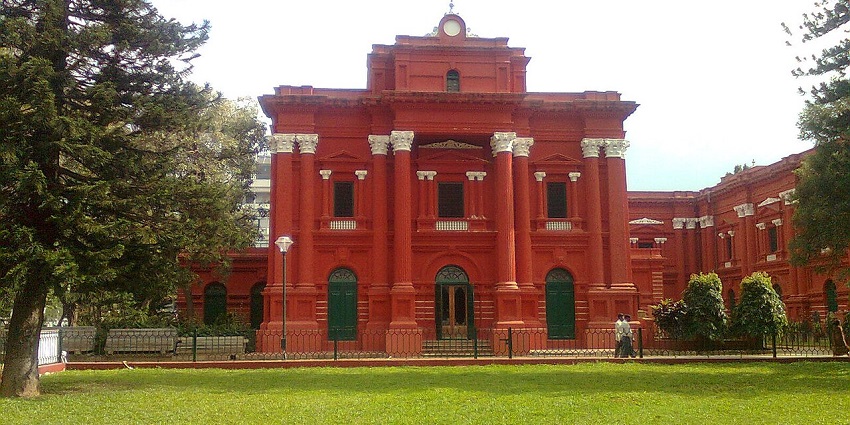 Red-brick neoclassical façade of the Government Museum, Bangalore near Cubbon Park.