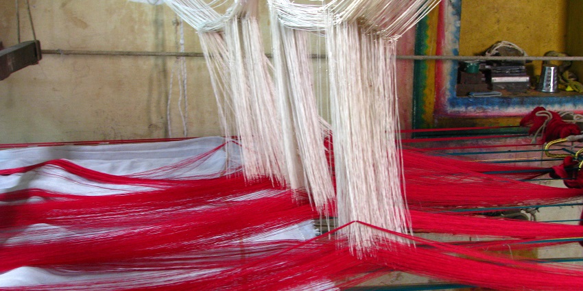 Shopping in Yercaud local stores featuring traditional handloom textiles and unique handicrafts.