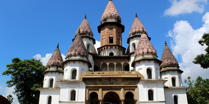 Majestic view of Hangseshwari Temple, with the bright blue sky in the background